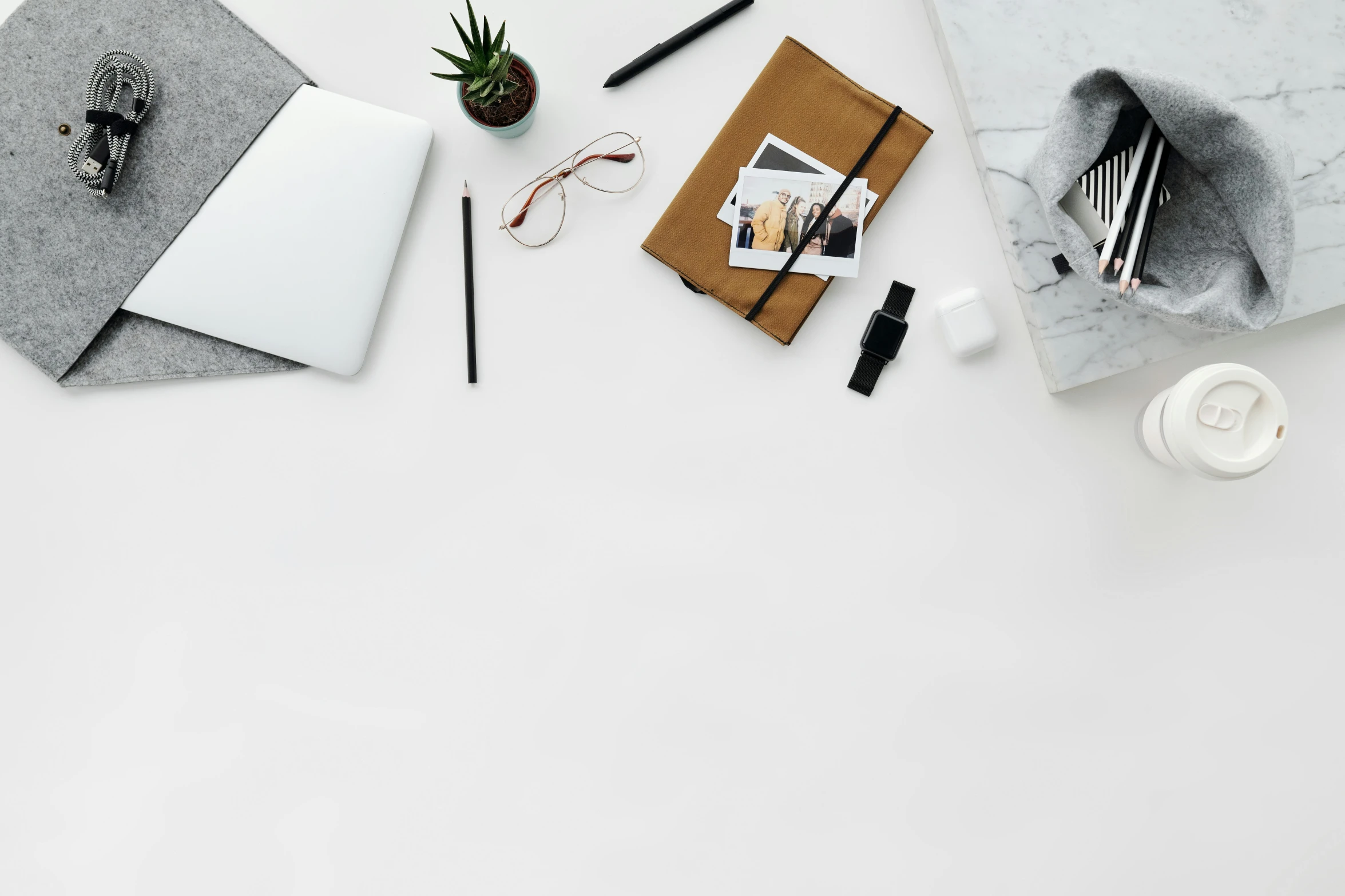 a laptop computer sitting on top of a white table, a picture, trending on pexels, minimalism, with a bunch of stuff, black on white, background image, 9 9 designs