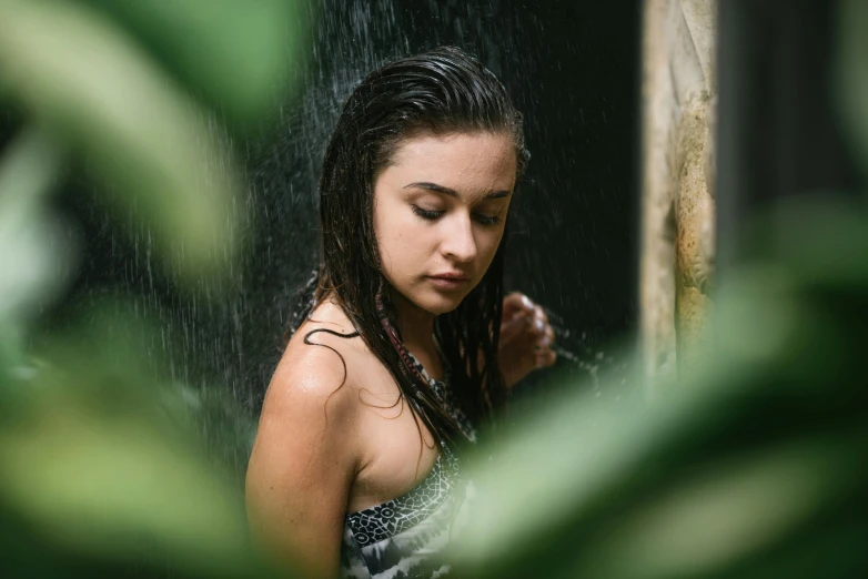 a woman with wet hair standing in the rain, inspired by Elsa Bleda, pexels contest winner, lush oasis, portrait sophie mudd, in jungle, mid 2 0's female