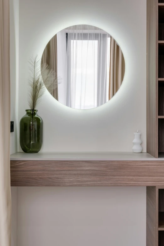 a mirror that is on a wall in a room, light and space, ambient lighting from top, jar on a shelf, zoomed out view, wood accents