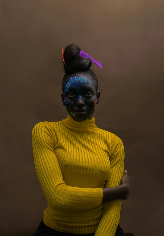 a woman with blue paint on her face, an album cover, inspired by Bert Stern, pexels contest winner, afrofuturism, black. yellow, professional body paint, nadav kander, blue turtleneck