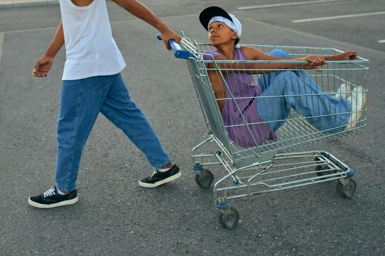 a man pushing a woman in a shopping cart, unsplash, hyperrealism, homeless, 2000s photo, lowrider style, on ground