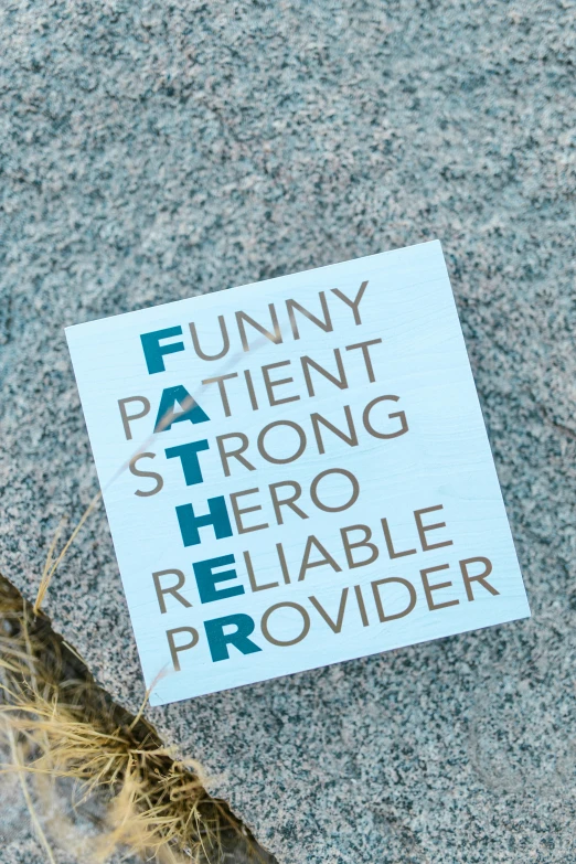 a sticker that is laying on the ground, inspired by Joseph Dwight Strong, caring fatherly wide forehead, pallet, hero prop, words