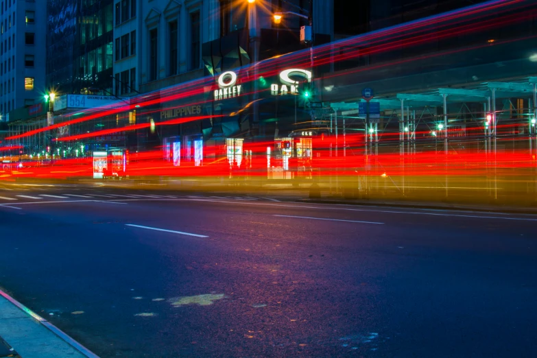 a red fire hydrant sitting on the side of a road, by Jay Hambidge, pexels contest winner, visual art, traffic with light trails, london bus, lunar busy street, vw bus on a street