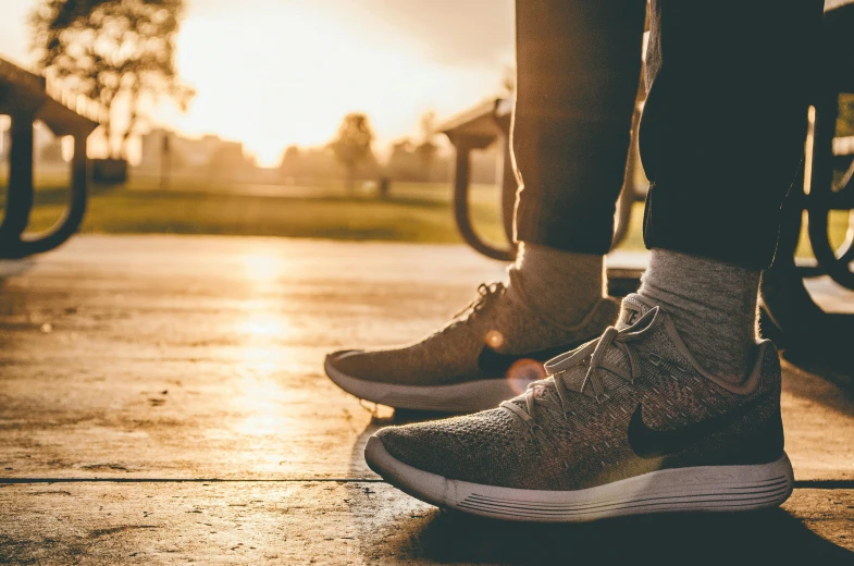 a person standing on a skateboard on a sidewalk, pexels contest winner, running shoes, dramatic warm morning light, sitting on a park bench, avatar image
