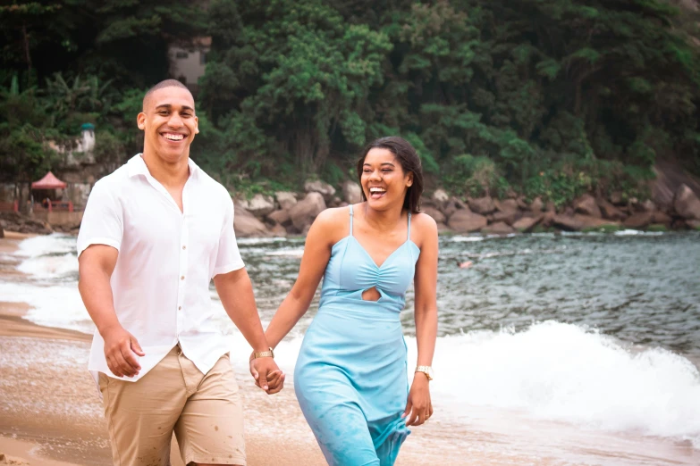 a man and a woman walking on a beach, a portrait, pexels contest winner, avatar image, smiling couple, mongezi ncaphayi, thumbnail