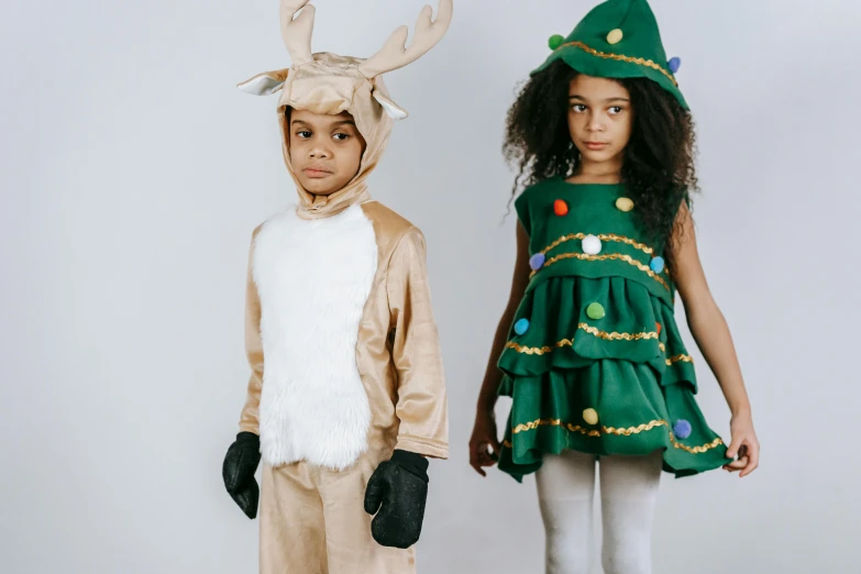 a couple of kids standing next to each other, pexels, diverse costumes, evergreen, ad image, high quality upload