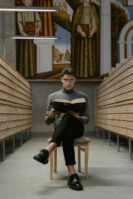 a man sitting on a bench reading a book, inspired by Fei Danxu, renaissance, standing in a church, julia hetta, post graduate, grand library