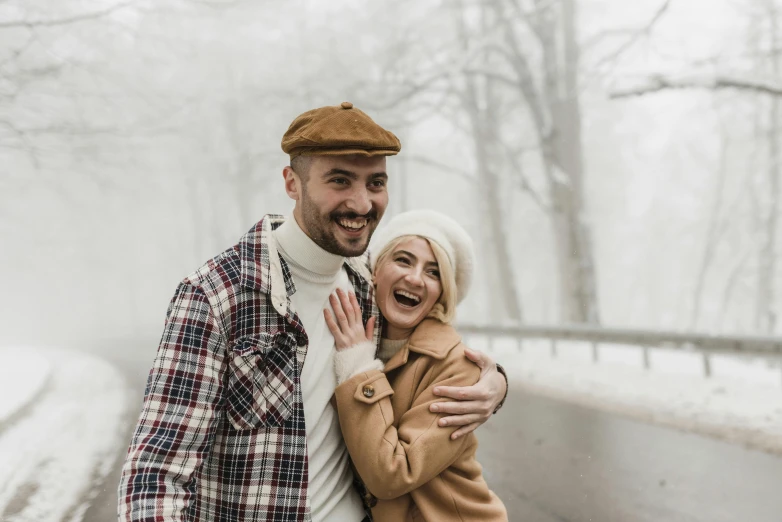 a man and woman standing next to each other in the snow, pexels contest winner, smiling :: attractive, avatar image, caucasian, brown