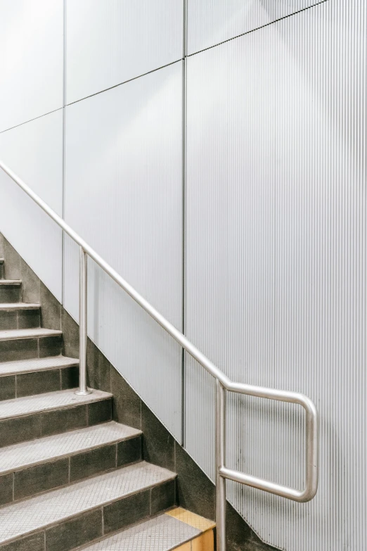 a set of stairs going up the side of a building, by Harvey Quaytman, unsplash, white panels, inside a frame on a tiled wall, non-pleated section, seamless