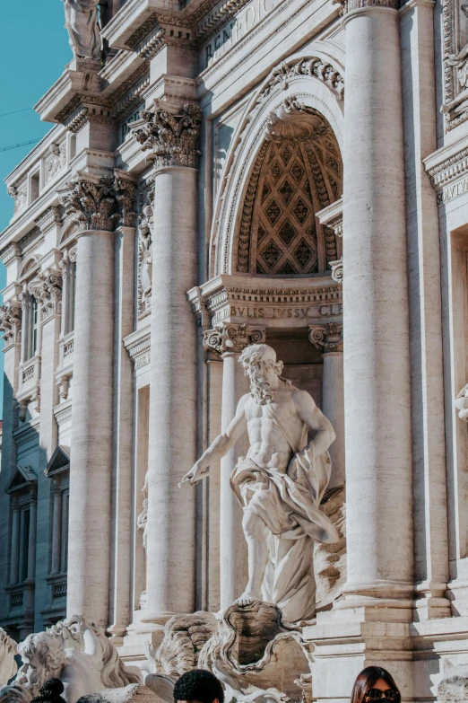 a group of people standing in front of a fountain, a statue, by Gian Lorenzo Bernini, pexels contest winner, neoclassicism, giant archways, profile image, seen from outside, made of marble