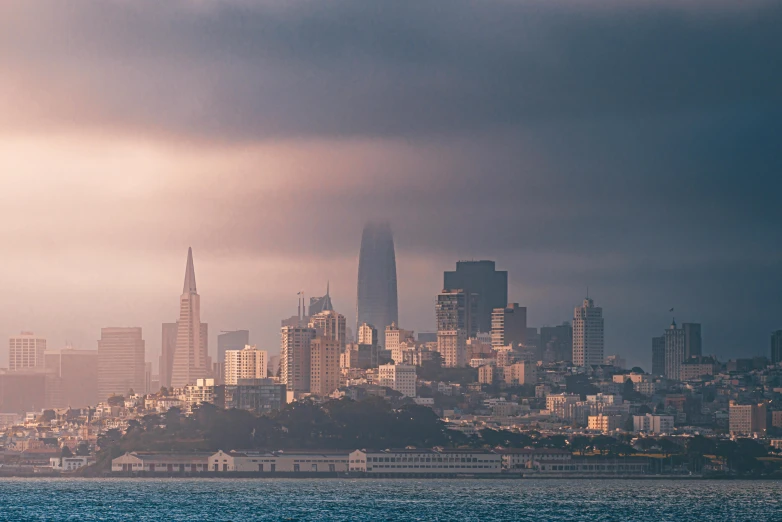 a large body of water with a city in the background, by Matt Stewart, unsplash contest winner, tonalism, background image, sf, panoramic, light haze