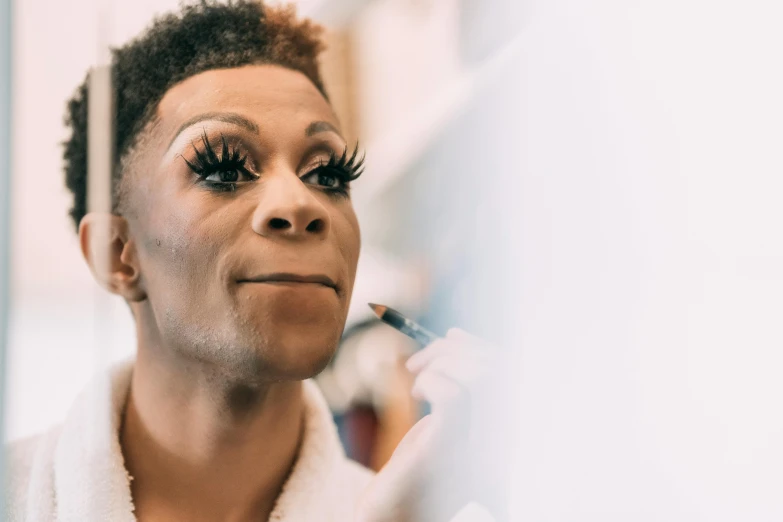 a woman brushing her teeth in front of a mirror, an album cover, trending on pexels, ru paul\'s drag race, kara walker, in professional makeup, white lashes