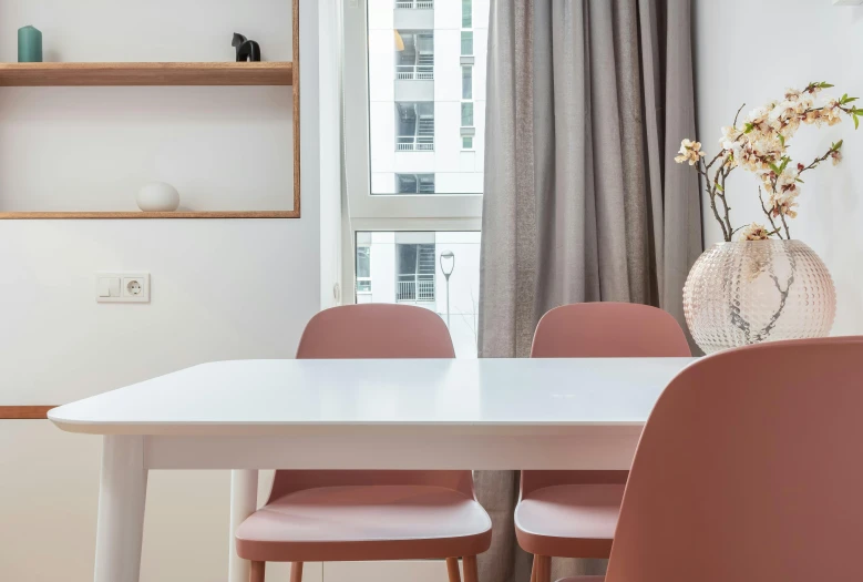 a white table topped with pink chairs next to a window, by Emma Andijewska, unsplash contest winner, minimalism, city apartment cozy calm, kitchenette and conferenceroom, close up details, ultra-high details