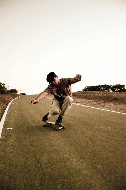 a man riding a skateboard down the middle of a road, profile image, gnarled, nathan fowkes, greg rutwoski