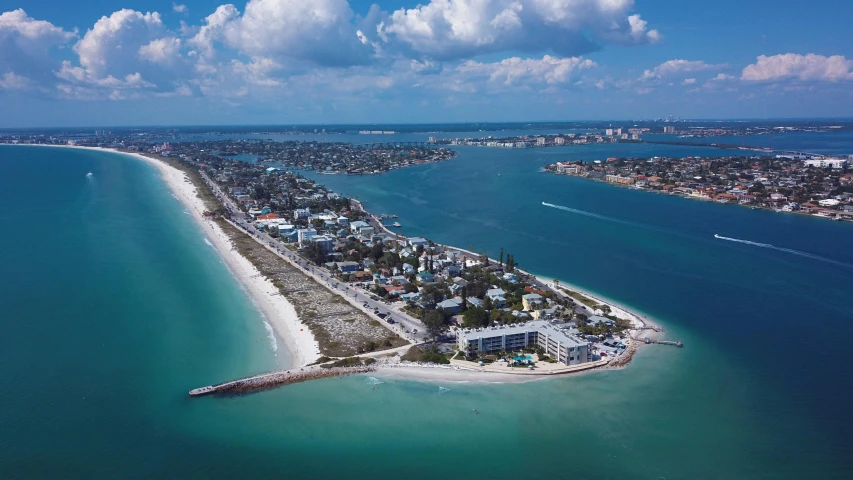 a large body of water next to a beach, by Bernie D’Andrea, treasure island, aerial, beachfront, waterfront houses