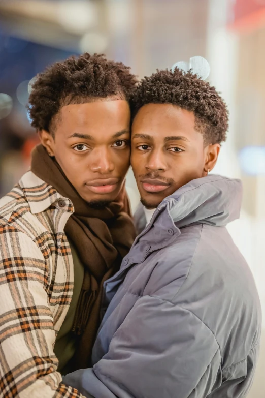 a couple of men standing next to each other, by Cosmo Alexander, trending on pexels, 2 1 savage, cuddling, gay rights, icy