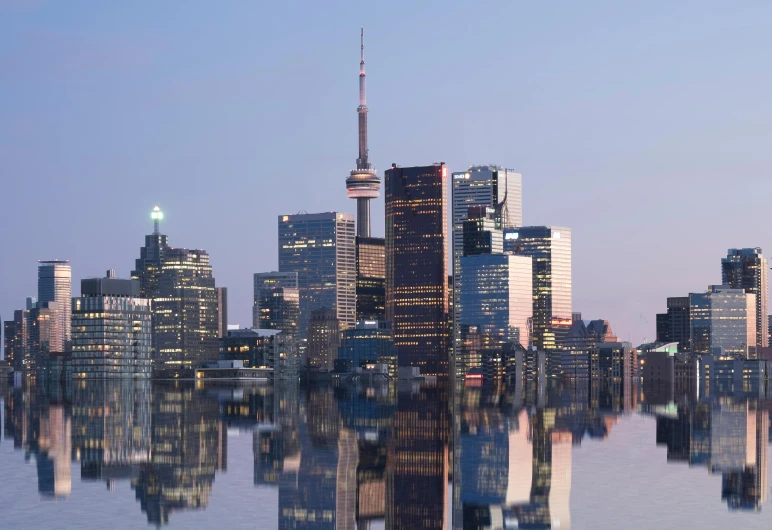 a large body of water with a city in the background, by John La Gatta, pexels contest winner, toronto city, slide show, stacked image, medium closeup