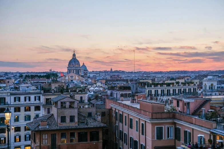 a view of a city from the top of a building, by Alessandro Allori, pexels contest winner, neoclassicism, golden hour dusk sky, profile image, pink marble building, high resolution photo