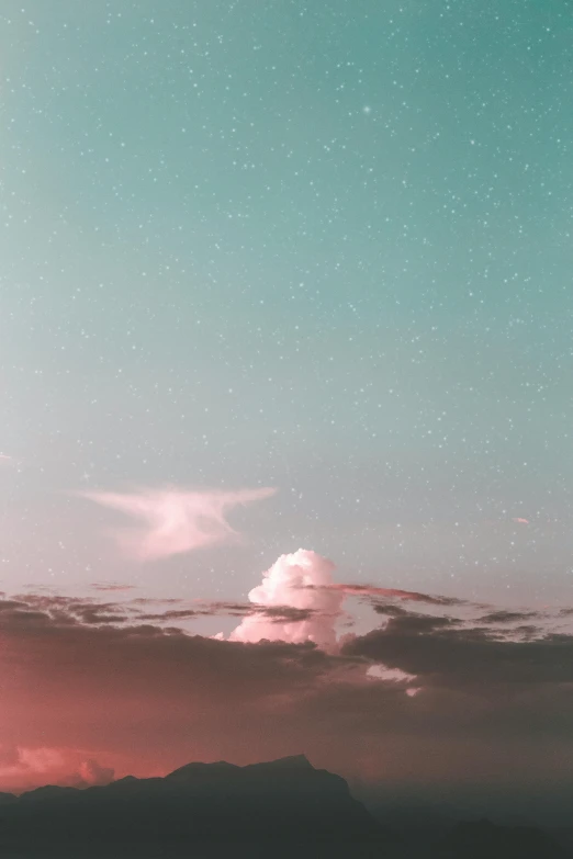 a sky with some clouds and mountains in the background, a polaroid photo, inspired by Elsa Bleda, pexels contest winner, magical realism, turquoise and pink lighting, spaceship in the sky, in the astral plane ) ) ), muted colors with minimalism