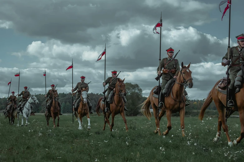 a group of men riding on the backs of horses, by Adam Marczyński, pexels contest winner, socialist realism, standing on the field of battle, slavic!!!, soldier clothing, post processing