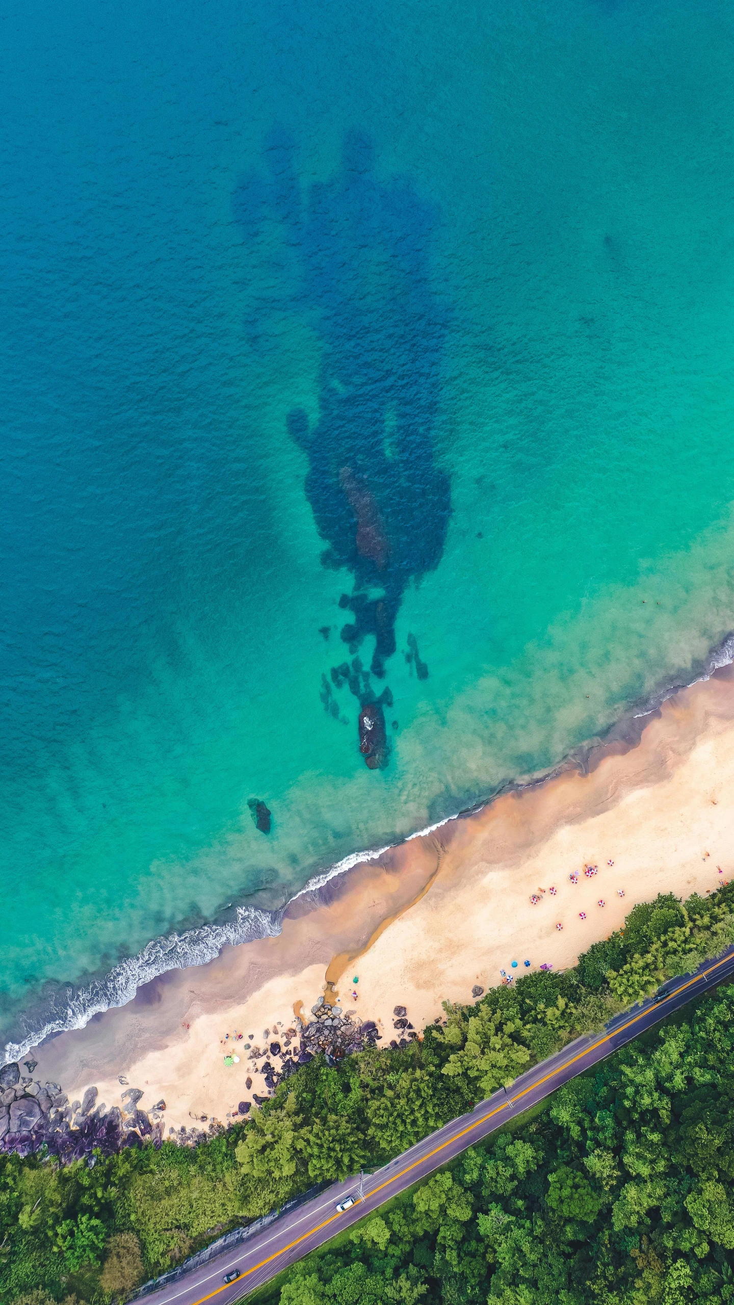 a large body of water next to a beach, a screenshot, pexels contest winner, shipwreck, drone photograpghy, puerto rico, manly