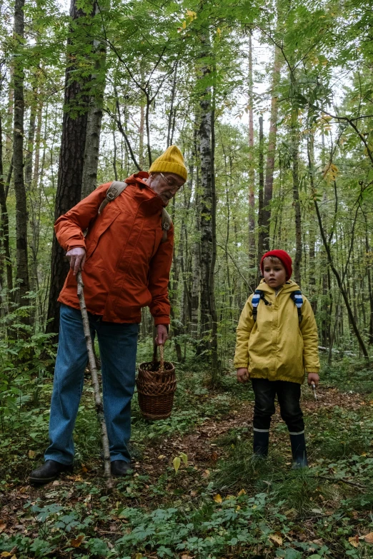 a man and a child in the woods, by Jaakko Mattila, pexels contest winner, still from a wes anderson movie, 2 5 6 x 2 5 6 pixels, greta thunberg, mid fall