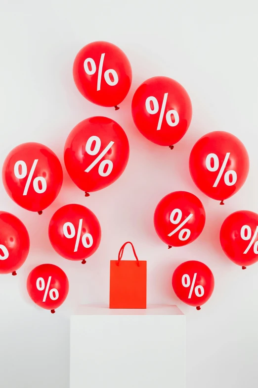 a bunch of red balloons with percentage signs on them, arper's bazaar, bags, detailed product shot, proportions off