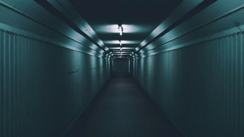 a long hallway with a light at the end, an album cover, unsplash contest winner, postminimalism, dark teal lighting, dystopian lighting, multiple stories, imgur