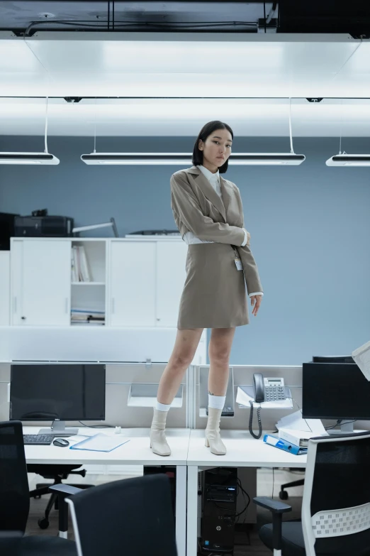 a woman standing on a table in an office, inspired by Feng Zhu, unsplash, hyperrealism, futuristic tech wear, jaeyeon nam, promo image, fully dressed