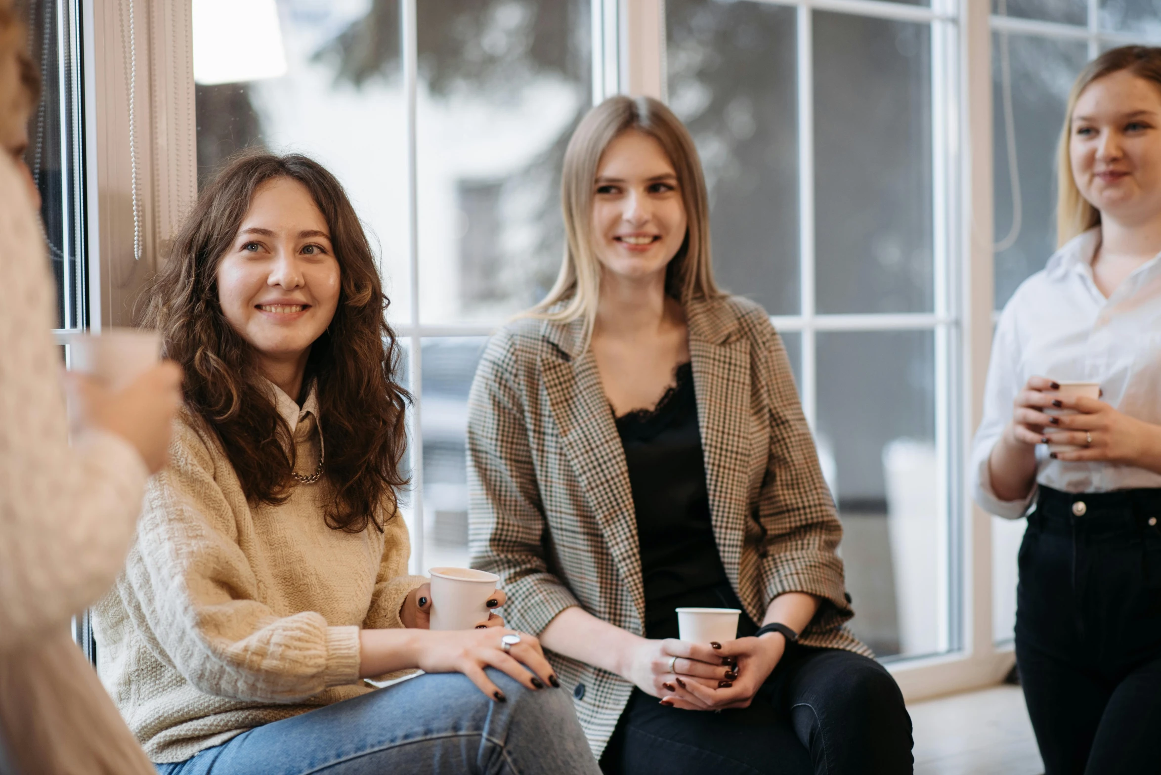 a group of women sitting next to each other, trending on unsplash, arbeitsrat für kunst, two buddies sitting in a room, avatar image, background image, aussie baristas