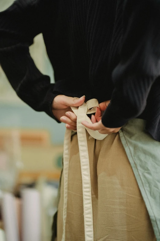 a woman measuring her waist with a tape, by Nina Hamnett, intricate hakama, soft muted colors, snacks, designed for cozy aesthetics!