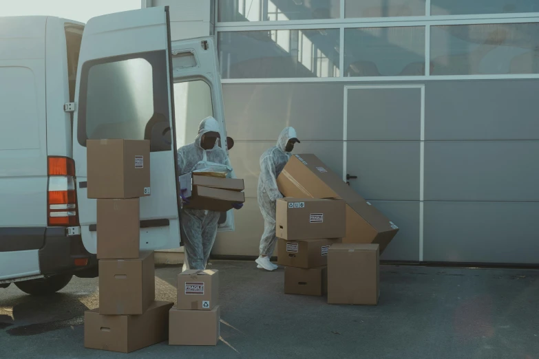 a couple of men loading boxes into a van, by Andries Stock, pexels contest winner, arbeitsrat für kunst, hazmat suits, trypophobia, animation still, 3 - piece