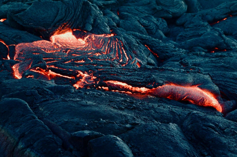a close up of lava on the surface of a body of water, pexels contest winner, hurufiyya, avatar image, structural geology, navy, music video