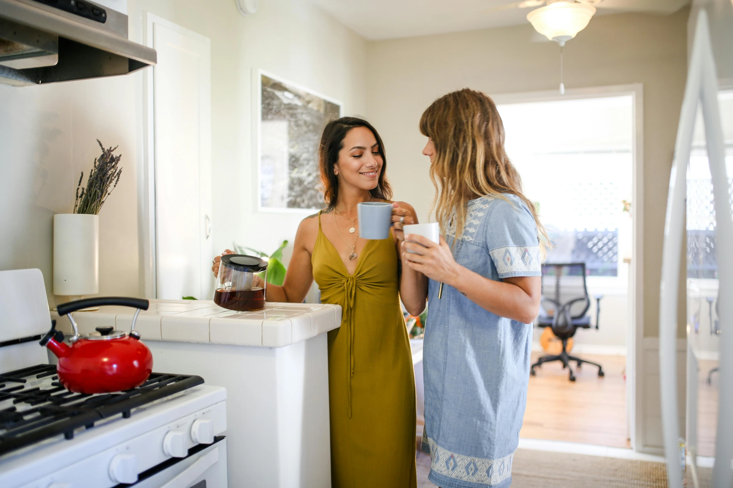 a couple of women standing next to each other in a kitchen, bay area, inside a cozy apartment, profile image, blue print