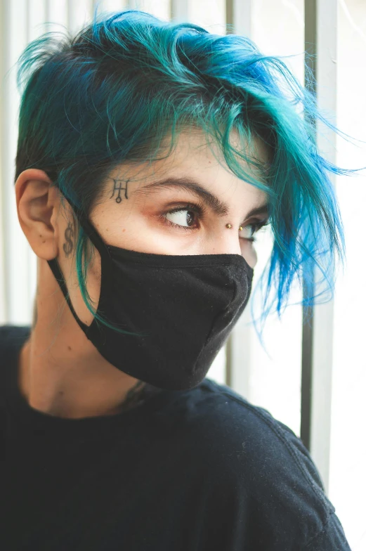 a woman with blue hair wearing a black mask, inspired by Elsa Bleda, undercut, non binary model, medical mask, syd