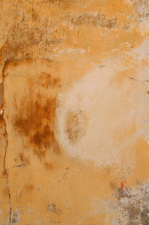 a red fire hydrant sitting on top of a cement wall, an album cover, inspired by Antoni Tàpies, trending on unsplash, worn mono - yellow wallpaper, detail texture, light - brown wall, 144x144 canvas