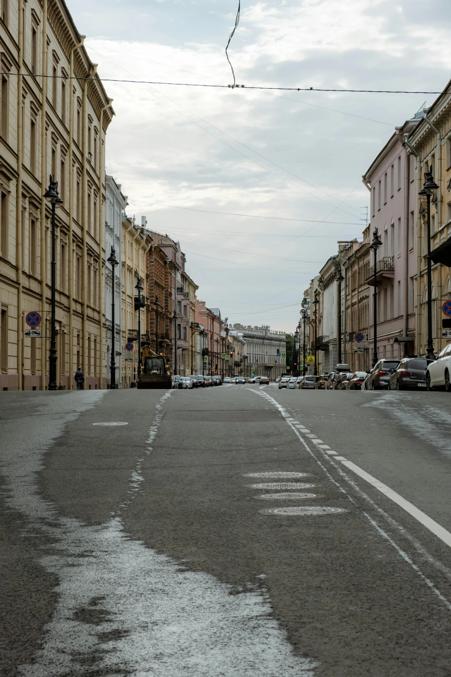 a man riding a bike down a street next to tall buildings, inspired by Illarion Pryanishnikov, unsplash, renaissance, saint petersburg, empty street, pale colors, on a great neoclassical square