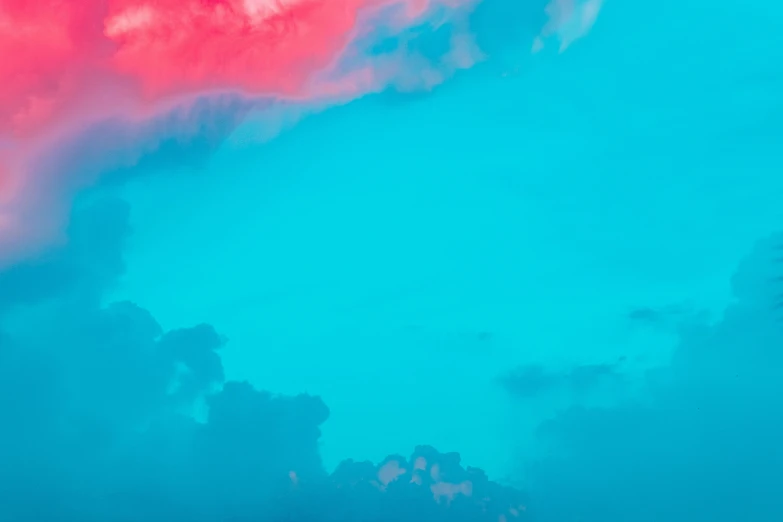 a plane flying through a cloudy blue sky, an album cover, inspired by Beeple, pexels contest winner, color field, in the colors hot pink and cyan, wallpaper mobile, red clouds, blue colors with red accents