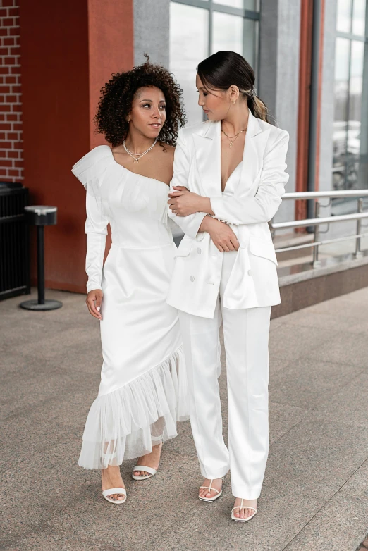 two women dressed in white walking down a sidewalk, trending on pexels, renaissance, wearing a white tuxedo, ashteroth, ekaterina, square