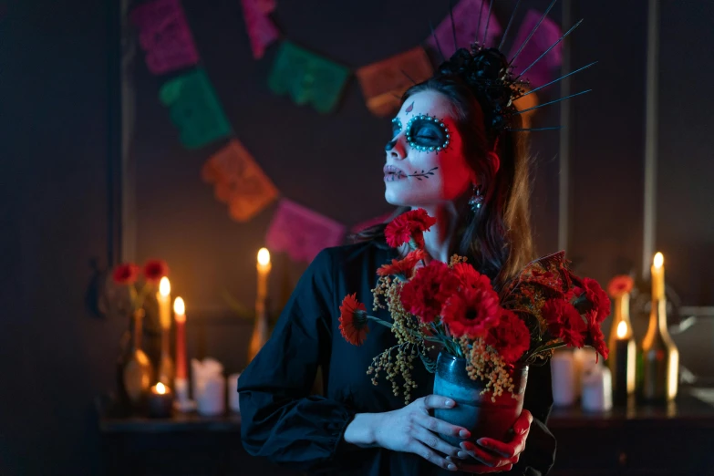 a woman in day of the dead makeup holding a vase of flowers, pexels contest winner, horror movie lighting, avatar image, holiday season, beautiful surroundings