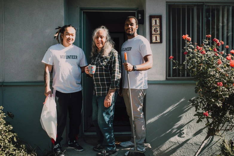 a group of people standing in front of a house, a portrait, unsplash, skilled homeless, bay area, avatar image, gunwoo kim and j.dickenson