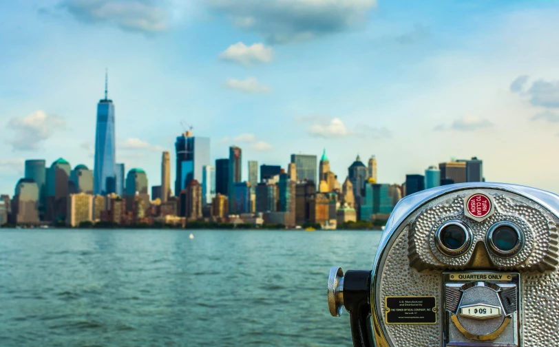 a coin operated viewer overlooking a city skyline, pexels contest winner, on liberty island, view from the sea, more intense, metropolitan