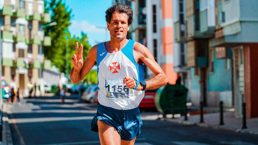 a man running on a city street with buildings in the background, pexels contest winner, renaissance, in a race competition, bispo do rosario, he is about 5 0 years old, 🚿🗝📝