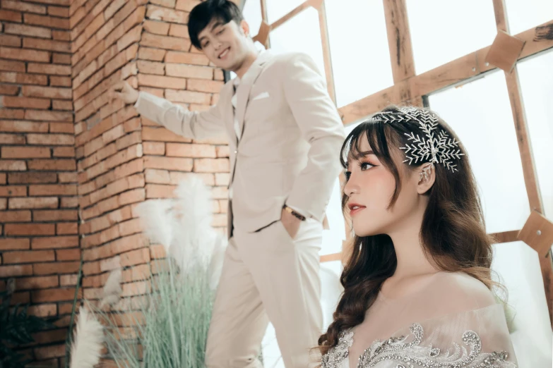 a man standing next to a woman in a wedding dress, inspired by Kim Du-ryang, background image, headpiecehigh quality, thumbnail, high quality upload