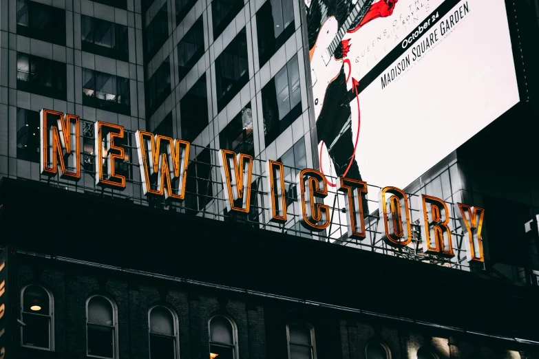 a sign that is on the side of a building, pexels contest winner, victory, watching new york, vicious, instagram photo