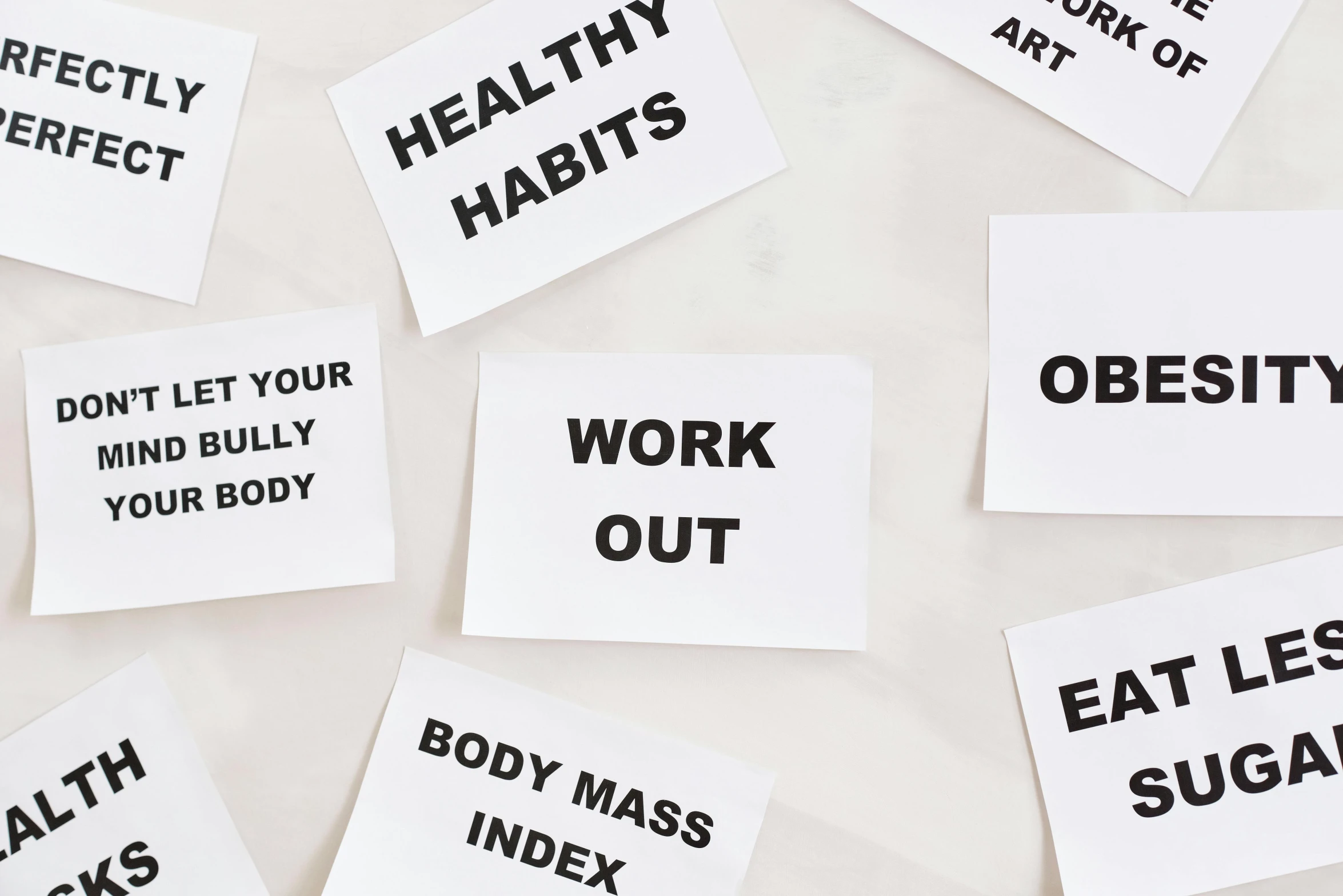 a bunch of signs sitting on top of a table, by Arabella Rankin, trending on pexels, workout, on white paper, health, cut out