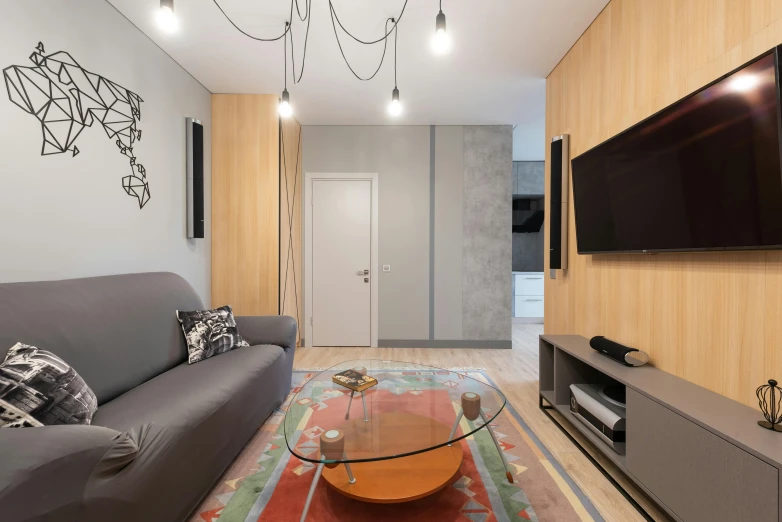 a living room filled with furniture and a flat screen tv, by Alexander Fedosav, pexels contest winner, cables on walls, neo kyiv, soft grey and red natural light, small and cosy student bedroom