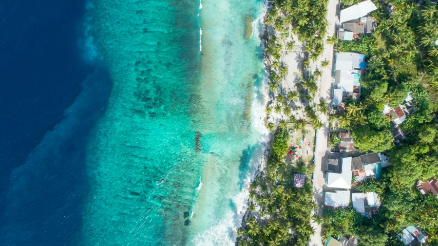 an aerial view of a small island in the middle of the ocean, pexels contest winner, carribean white sand, neighborhood, thumbnail, looking out at the ocean