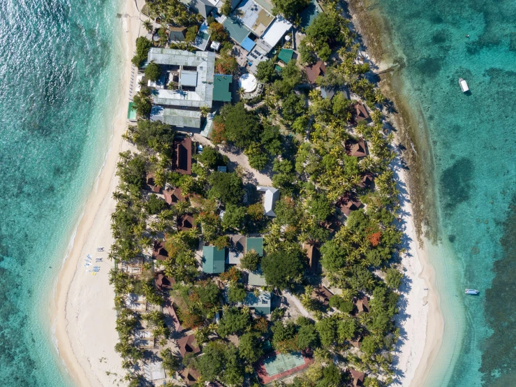 a small island in the middle of the ocean, a portrait, pexels contest winner, hurufiyya, beachfront mansion, birdseye view, philippines, white sandy beach