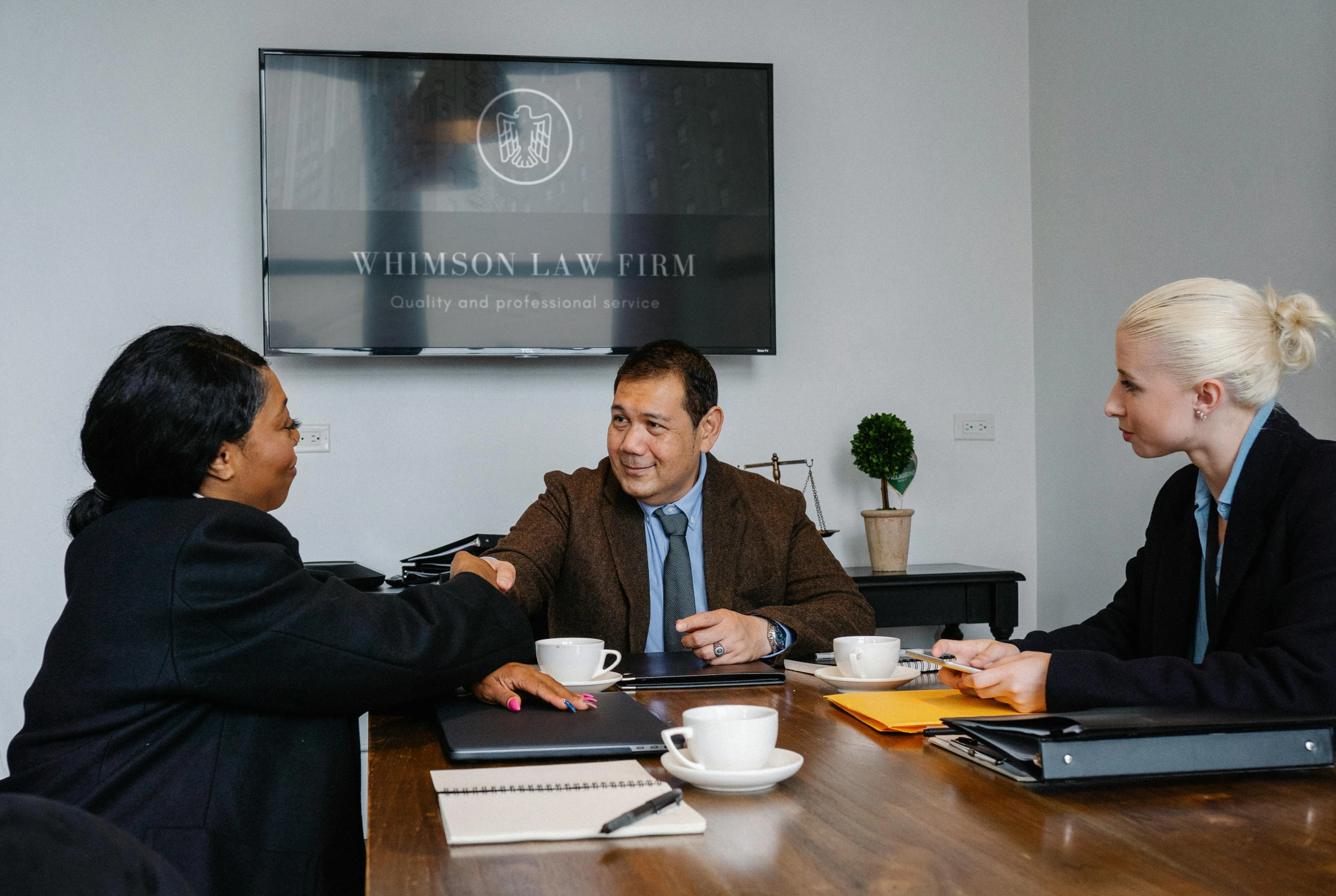 a group of people sitting around a wooden table, lawyer suit, winston, thumbnail, nivanh chanthara